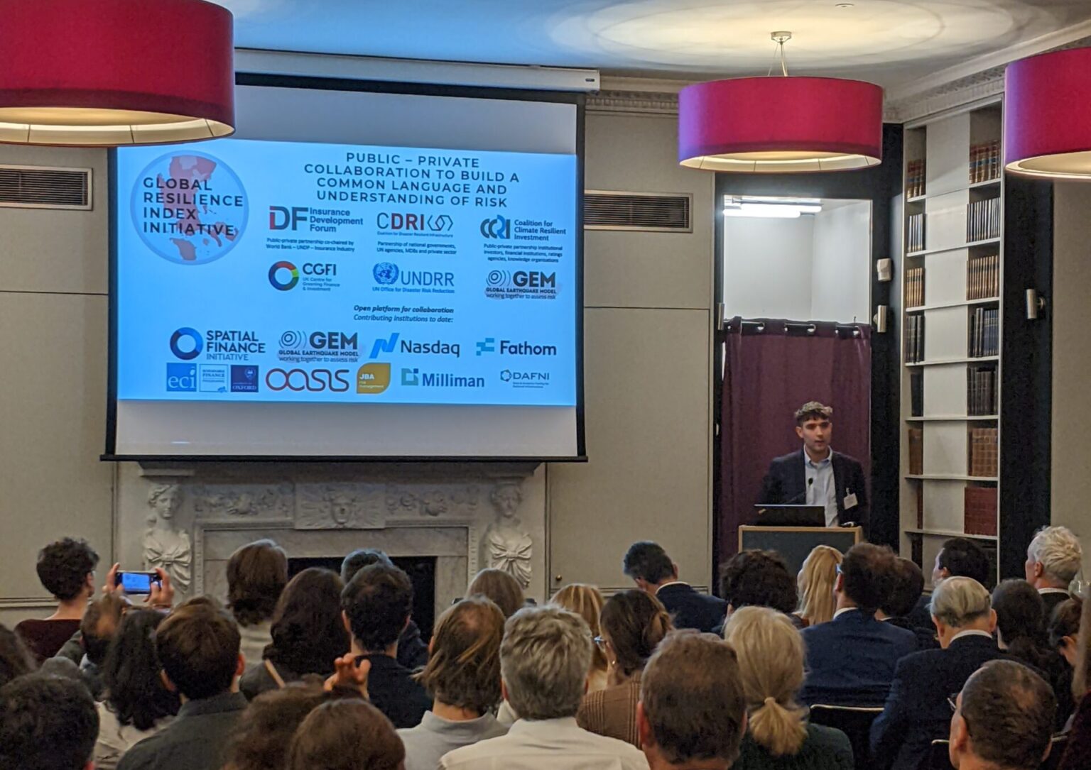 Dr Mark Bernhofen (Research Associate, CGFI) presenting on GRII